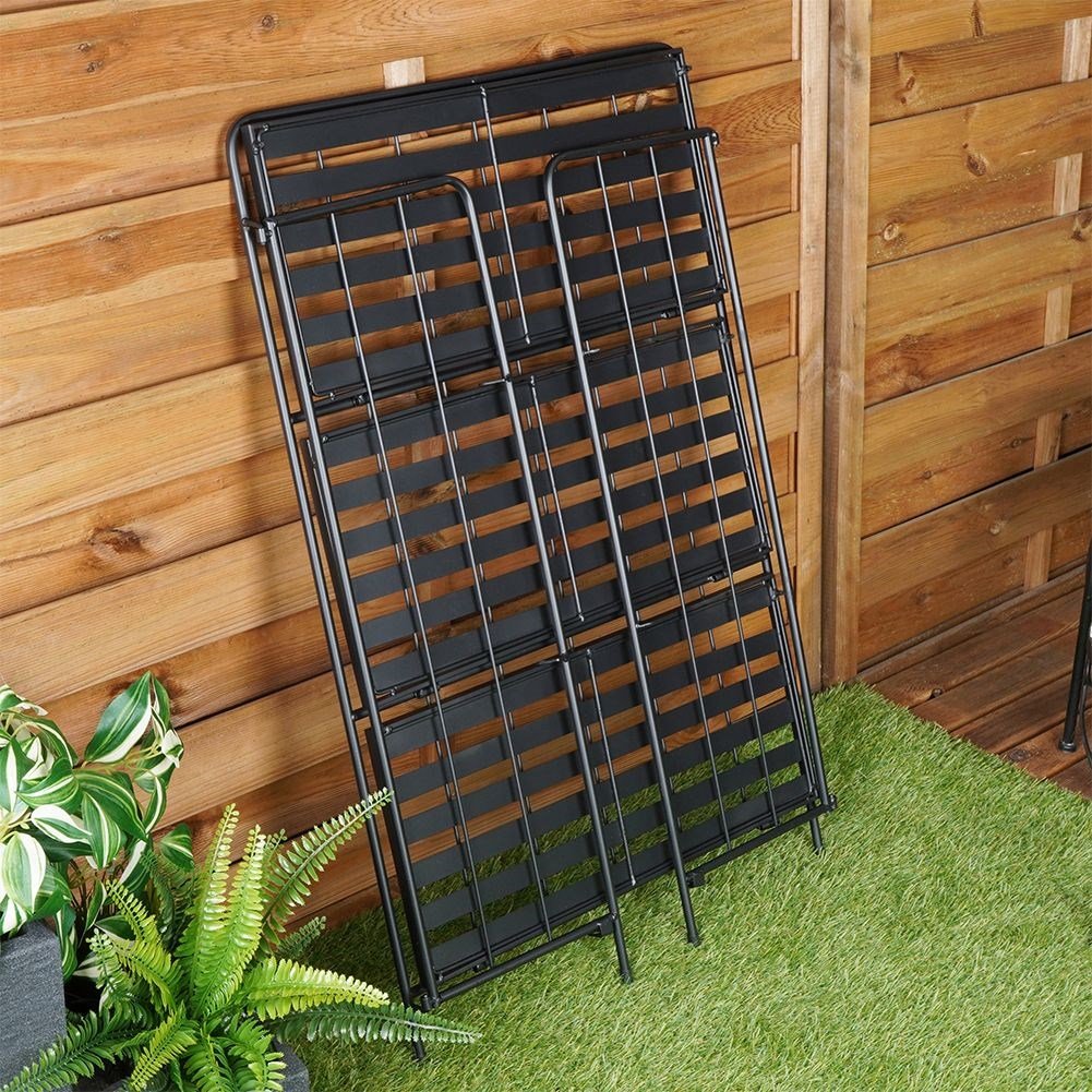 Flower stand in black metal with three levels for flower pots