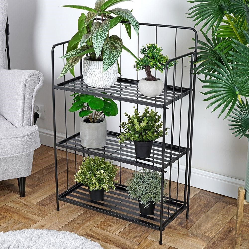 Flower stand in black metal with three levels for flower pots