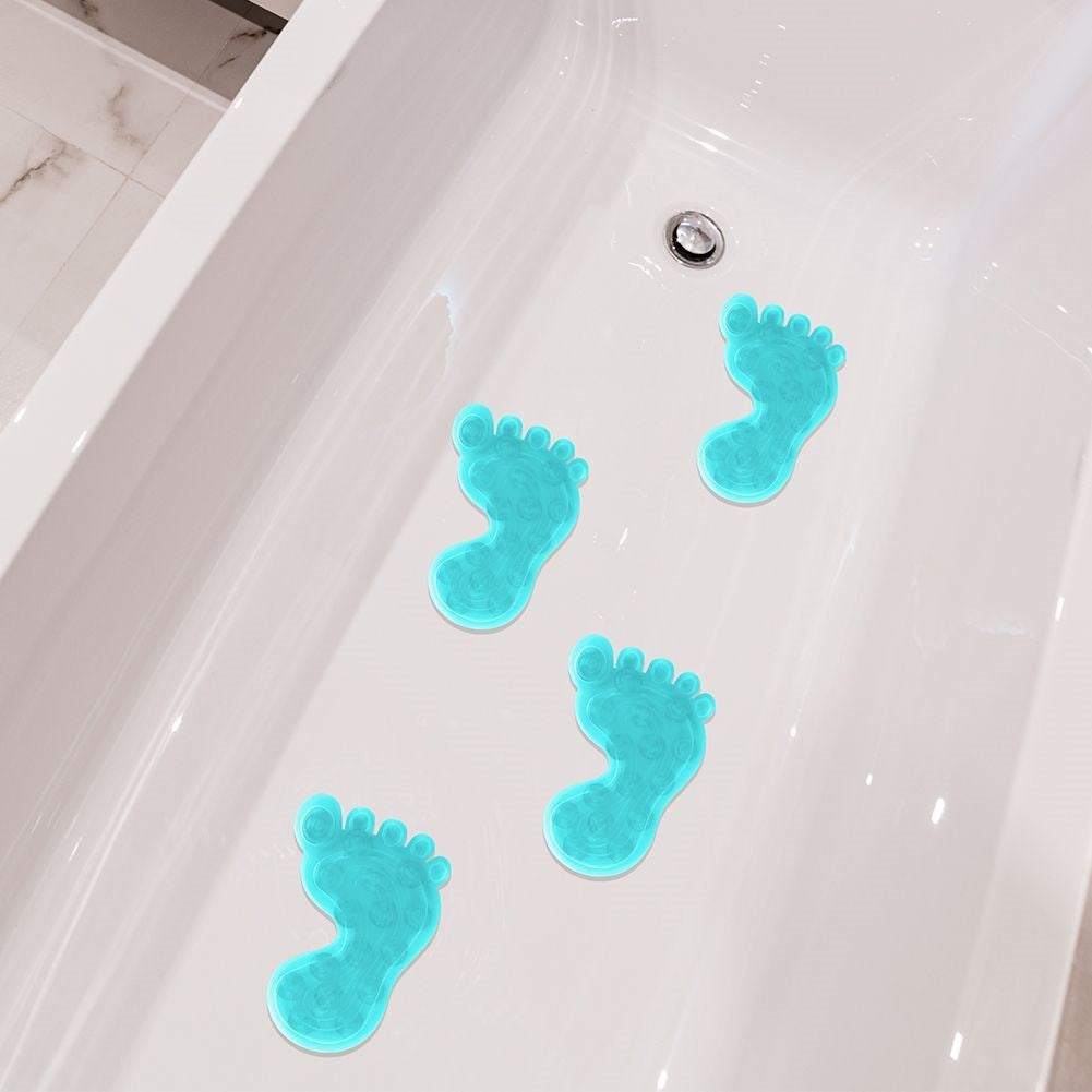 Four blue non-slip mats with suction cups for shower/bathtub