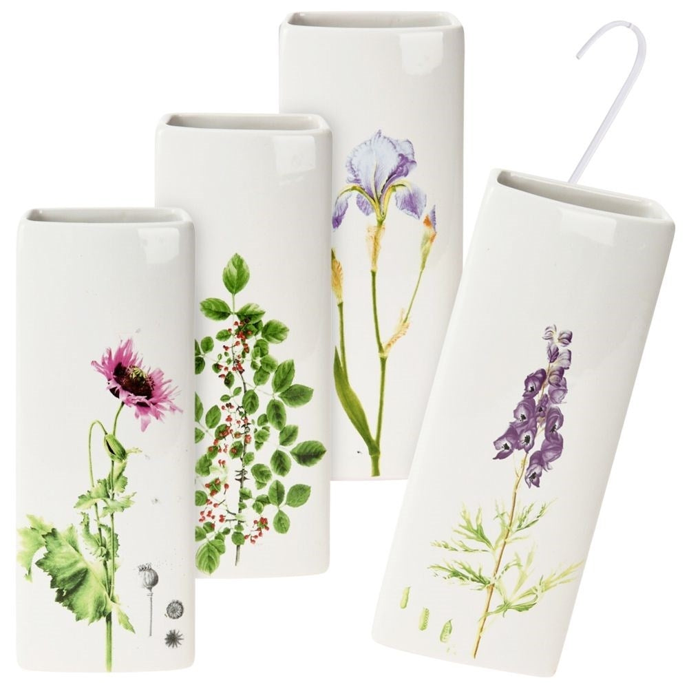 Four ceramic humidifiers with floral decorations for elements