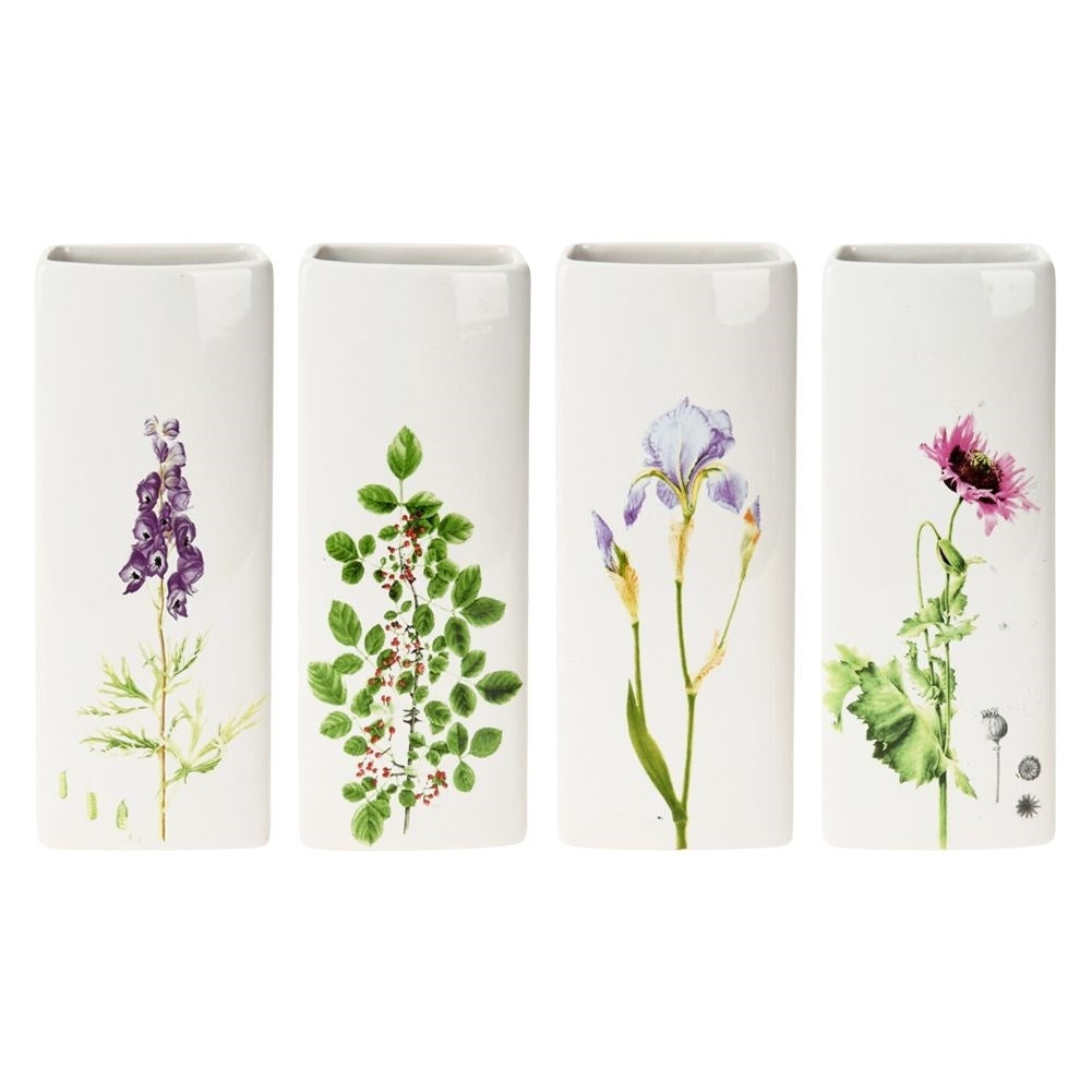 Four ceramic humidifiers with floral decorations for elements