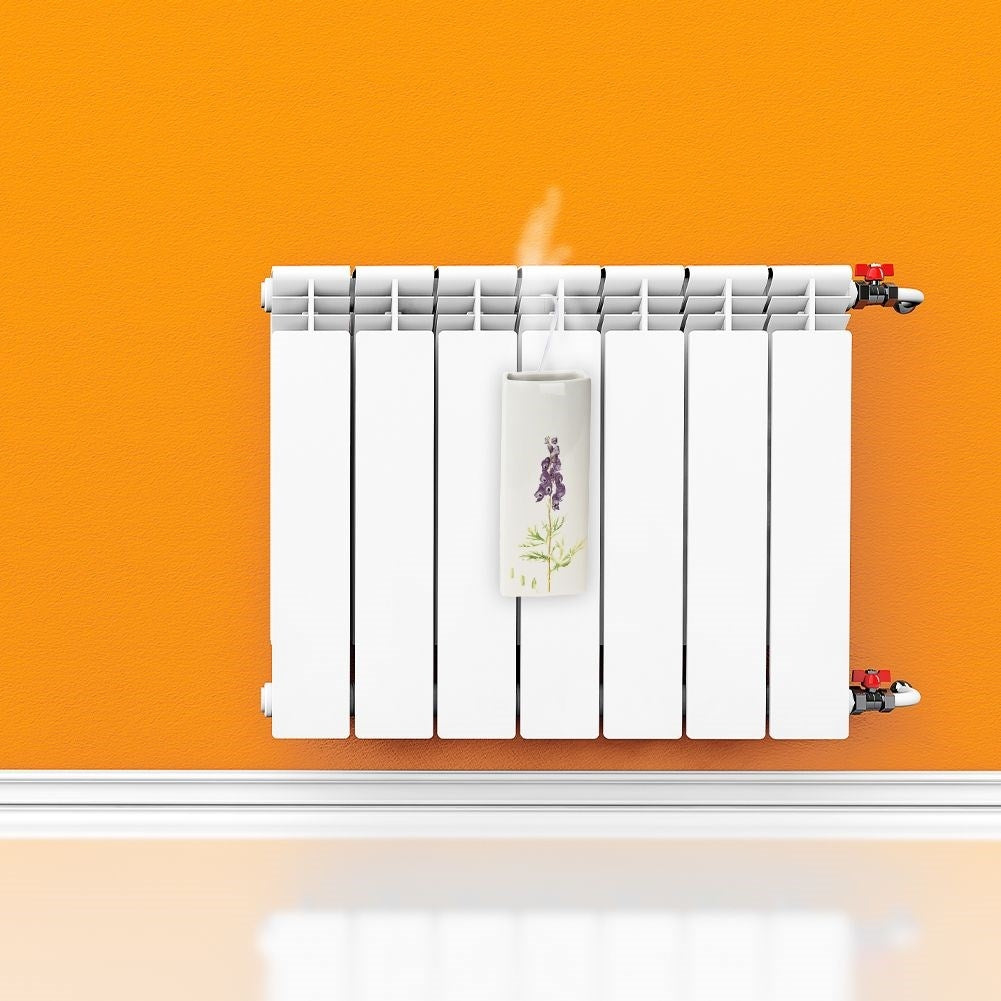 Four ceramic humidifiers with floral decorations for elements
