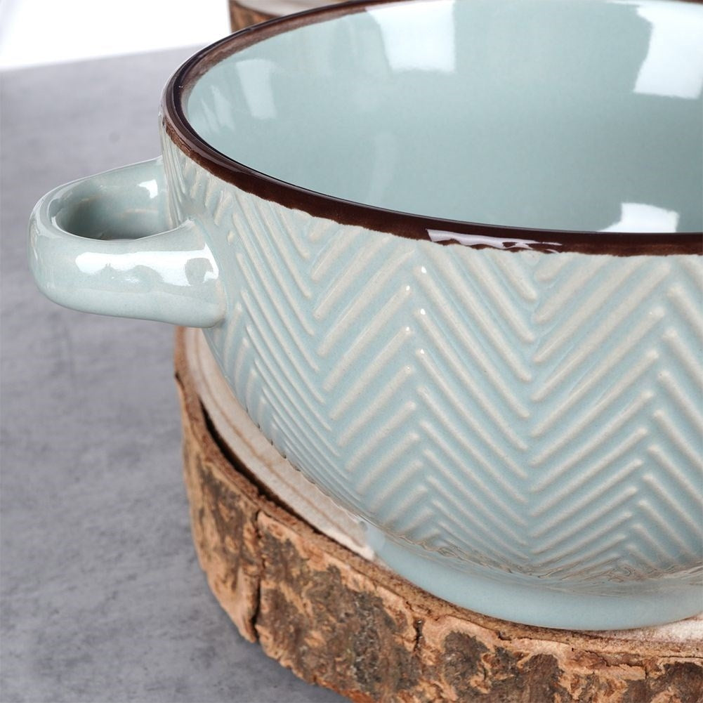 Four colorful ceramic bowls with handles, dishwasher and microwave safe