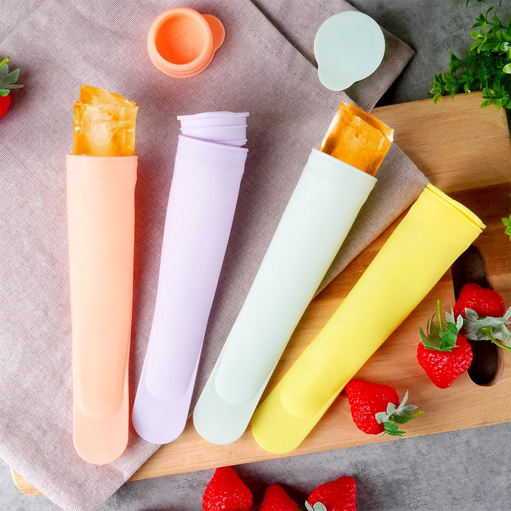 Four colorful silicone ice cream molds with tight-fitting lids