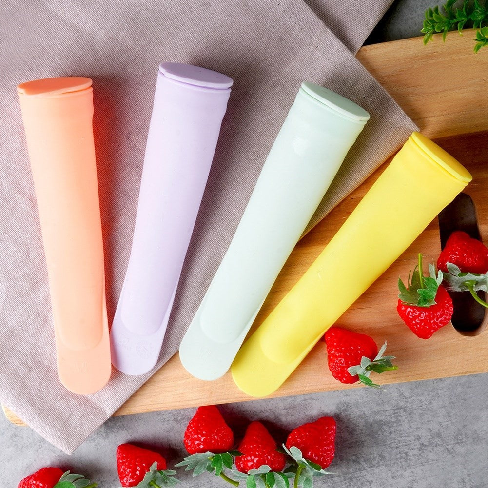 Four colorful silicone ice cream molds with tight-fitting lids