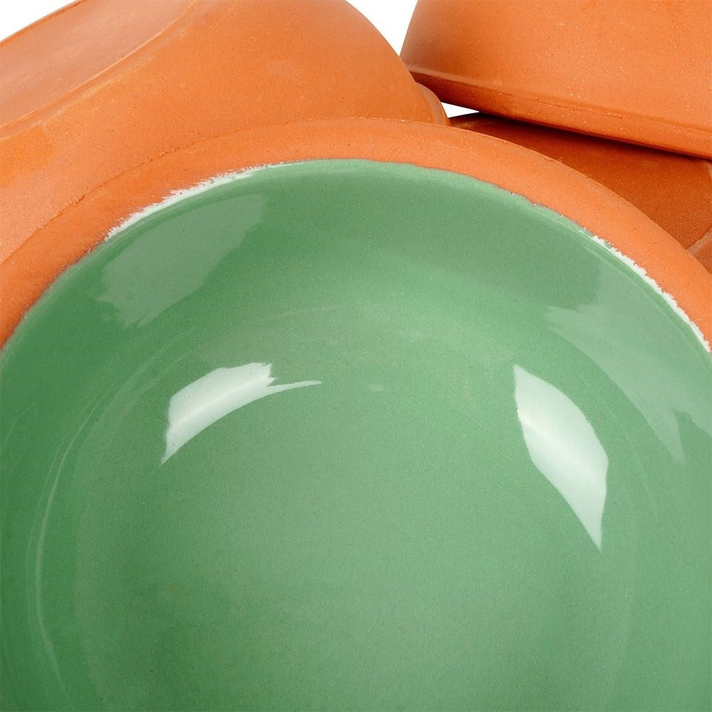 Four colorful stoneware baking tins for all dishes