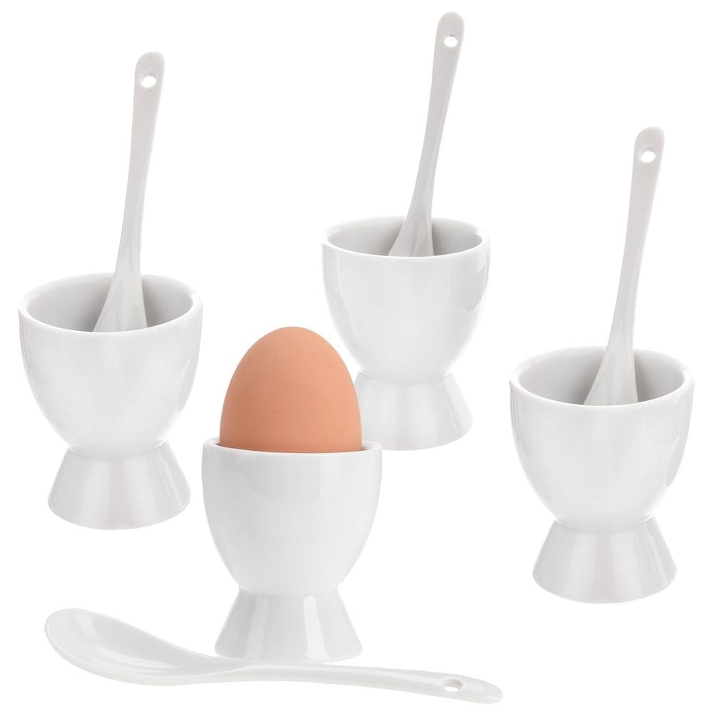 Four egg cups with spoons in white porcelain, dishwasher safe