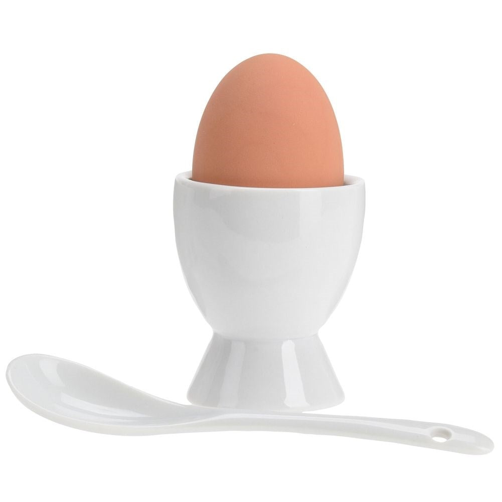Four egg cups with spoons in white porcelain, dishwasher safe