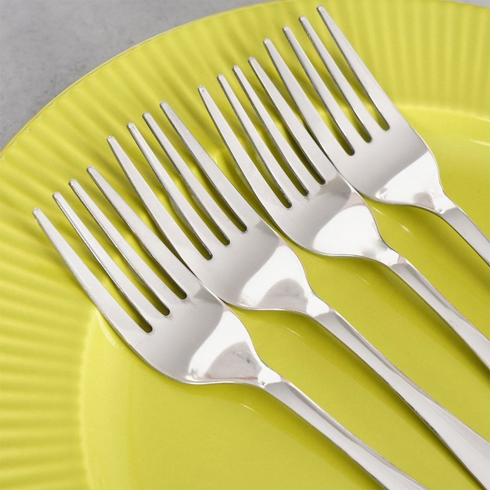 Four elegantly highly polished stainless steel table forks 19.5 cm