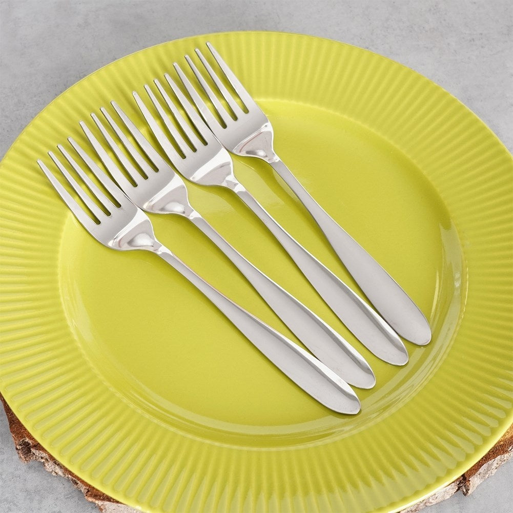 Four elegantly highly polished stainless steel table forks 19.5 cm