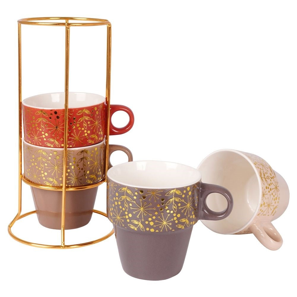 Four elegant porcelain mugs with gold stands and details