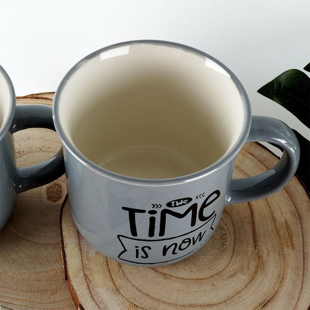 Four gray porcelain mugs with text, dishwasher safe