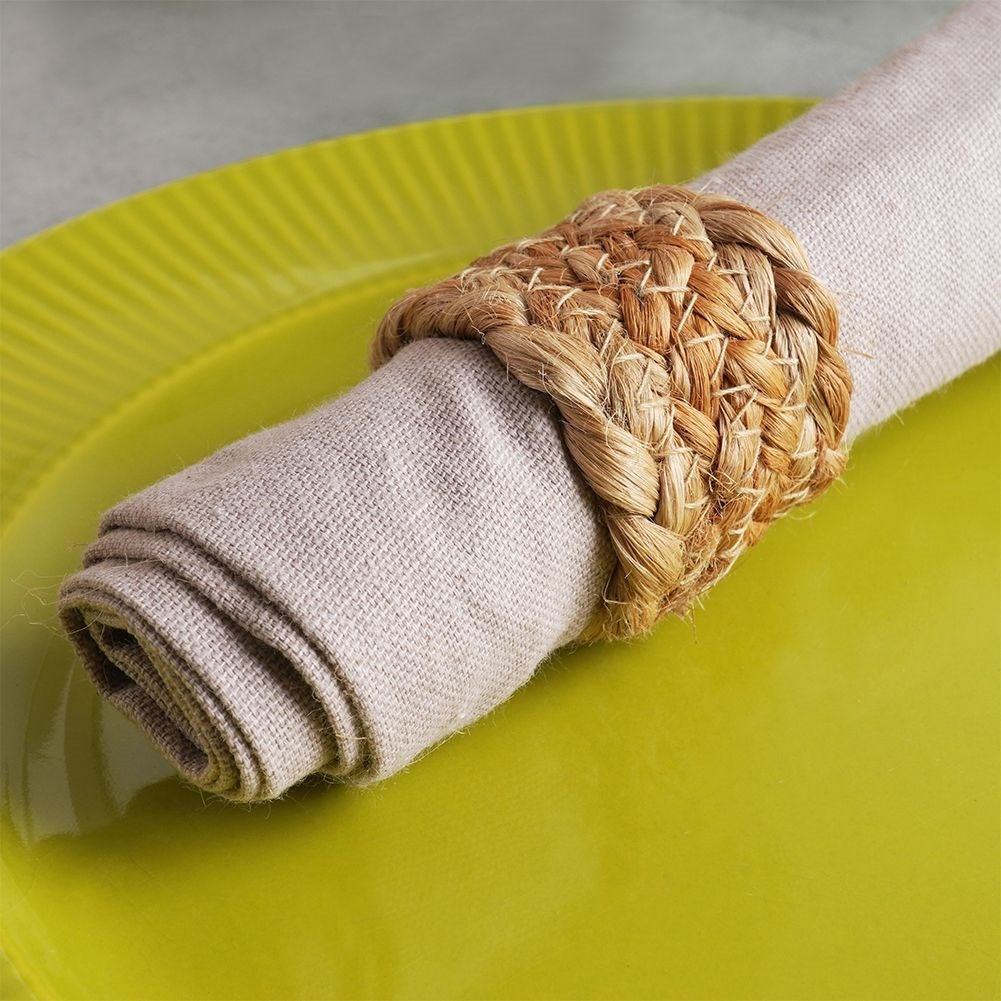 Four jute napkin rings, 4 cm diameter