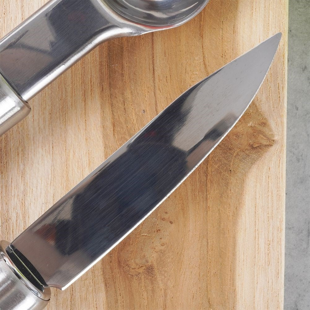 Four kitchen tools for fruits and vegetables in stainless steel
