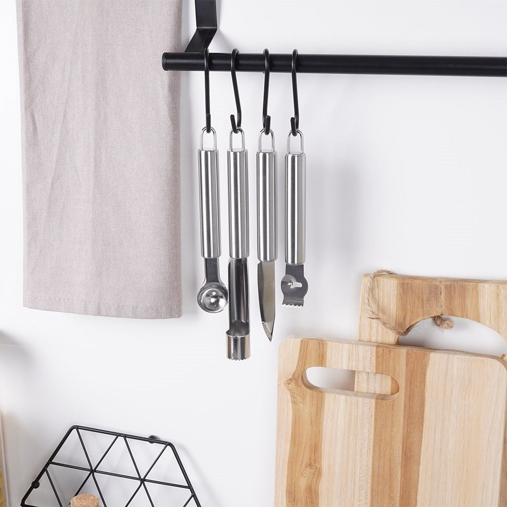 Four kitchen tools for fruits and vegetables in stainless steel