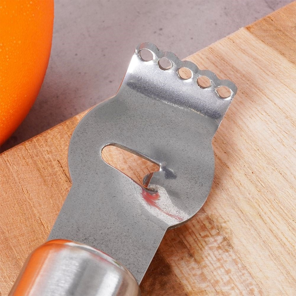 Four kitchen tools for fruits and vegetables in stainless steel