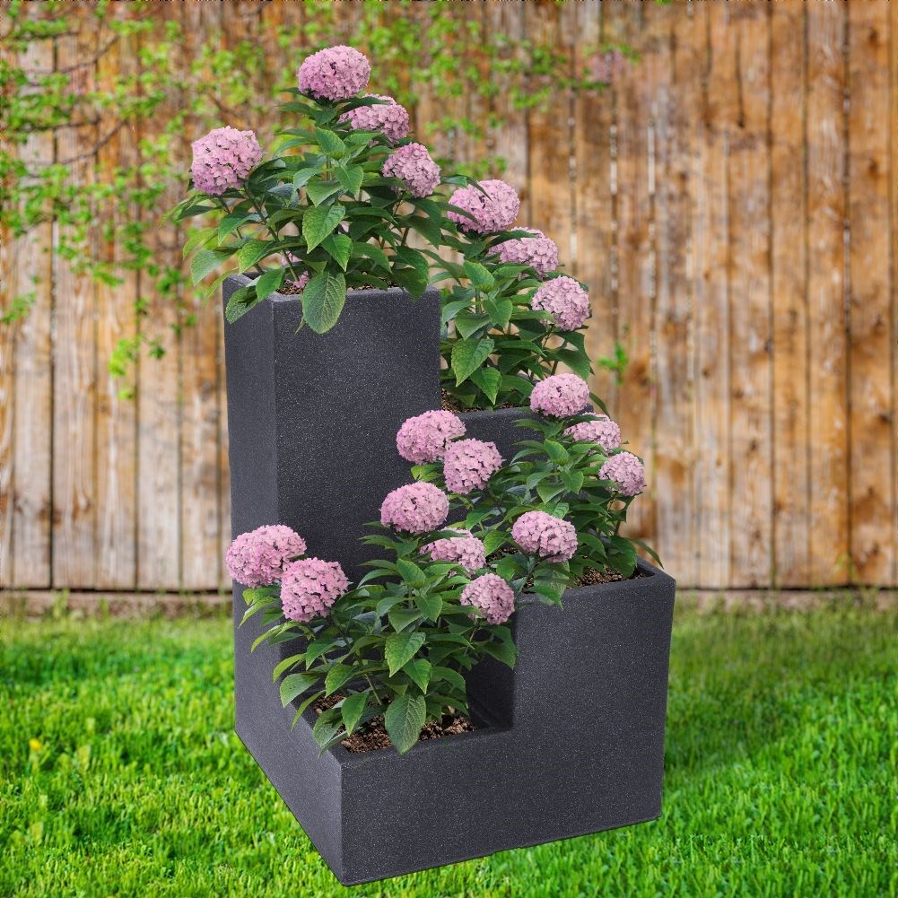 Four levels of plant cascade in stone imitation for the garden
