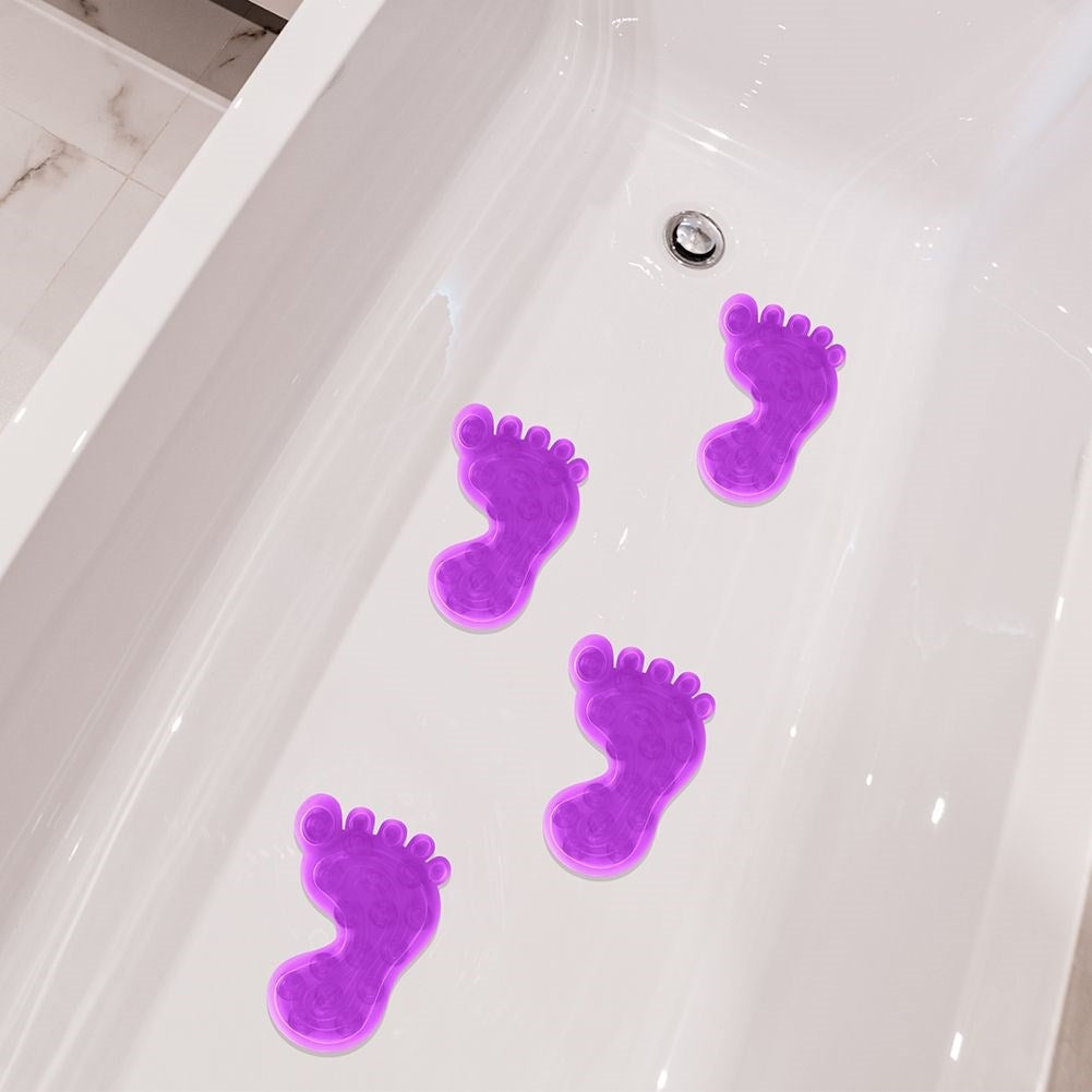 Four purple anti-slip mats with suction cups for shower/bathtub