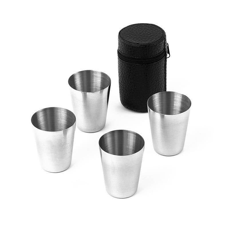 Four stainless steel cups with cases for outdoor parties