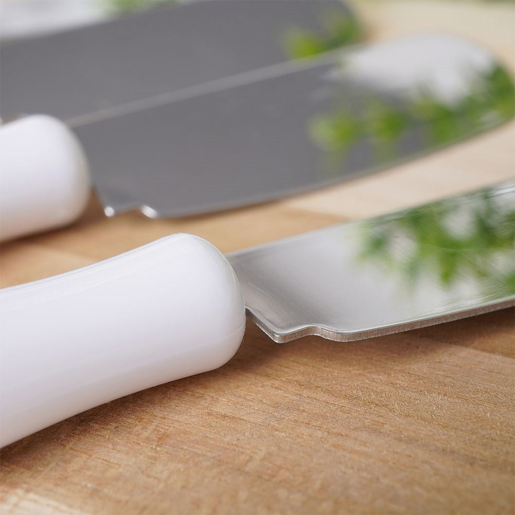 Four stainless steel knives for butter, cheeses and toppings