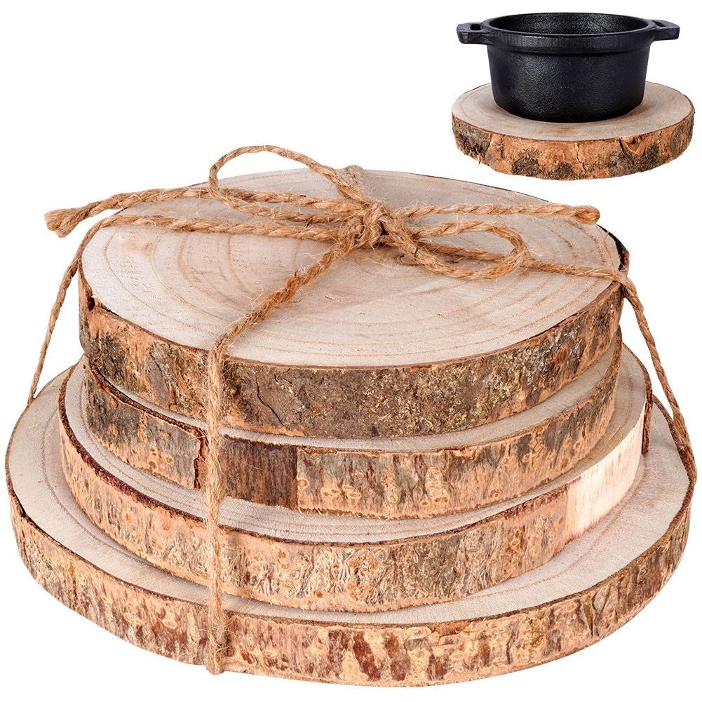 Four wooden boards with bark - natural coasters for cups and candles