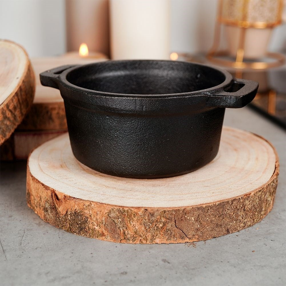 Four wooden boards with bark - natural coasters for cups and candles