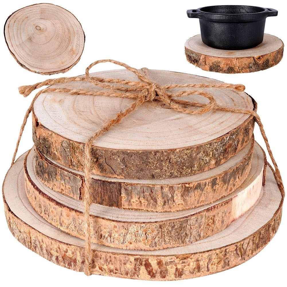 Four wooden boards with bark - natural coasters for cups and candles
