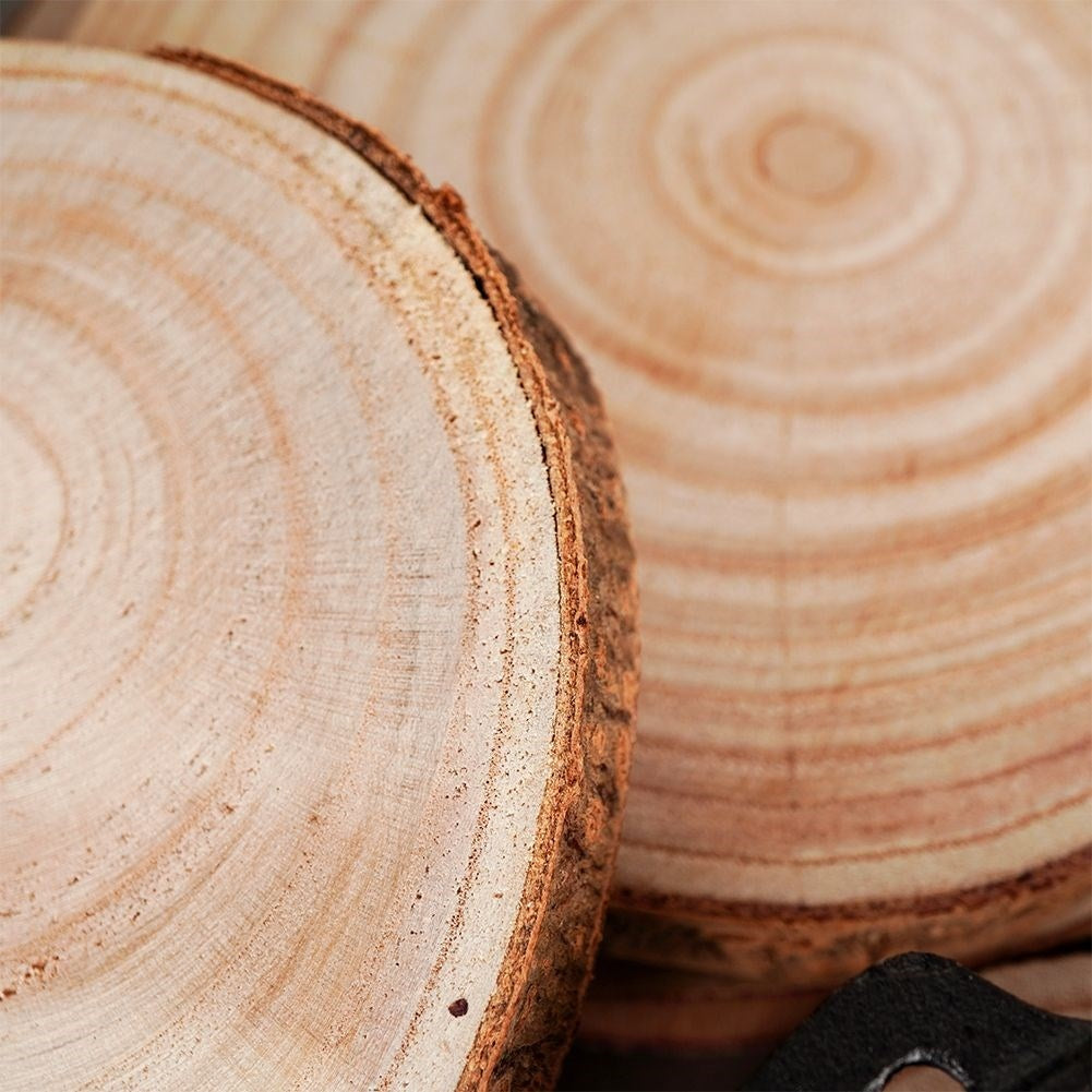 Four wooden boards with bark - natural coasters for cups and candles