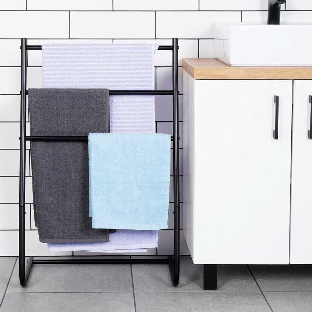Freestanding black towel rack with three cross bars