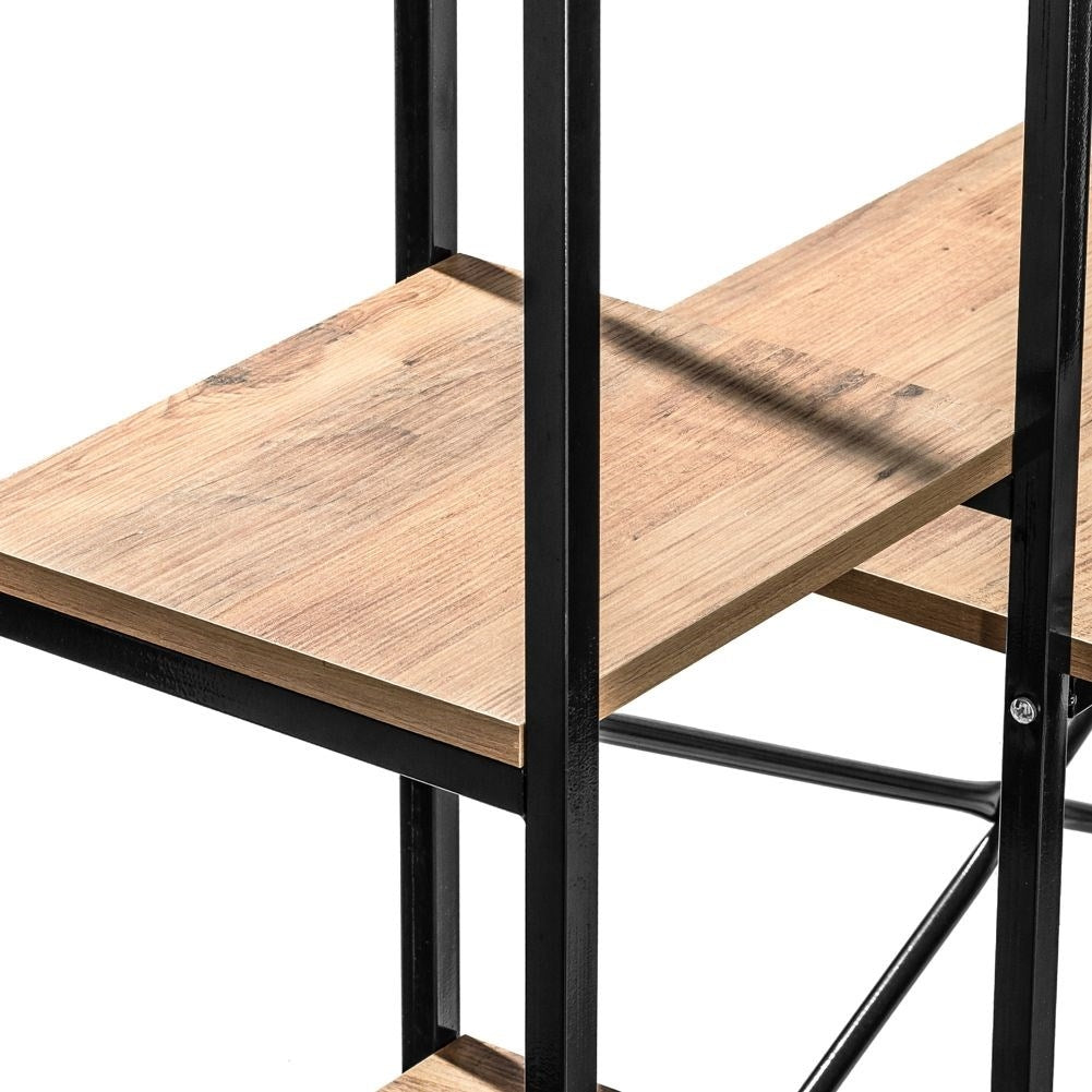 Freestanding desk with tall bookshelf for office.
