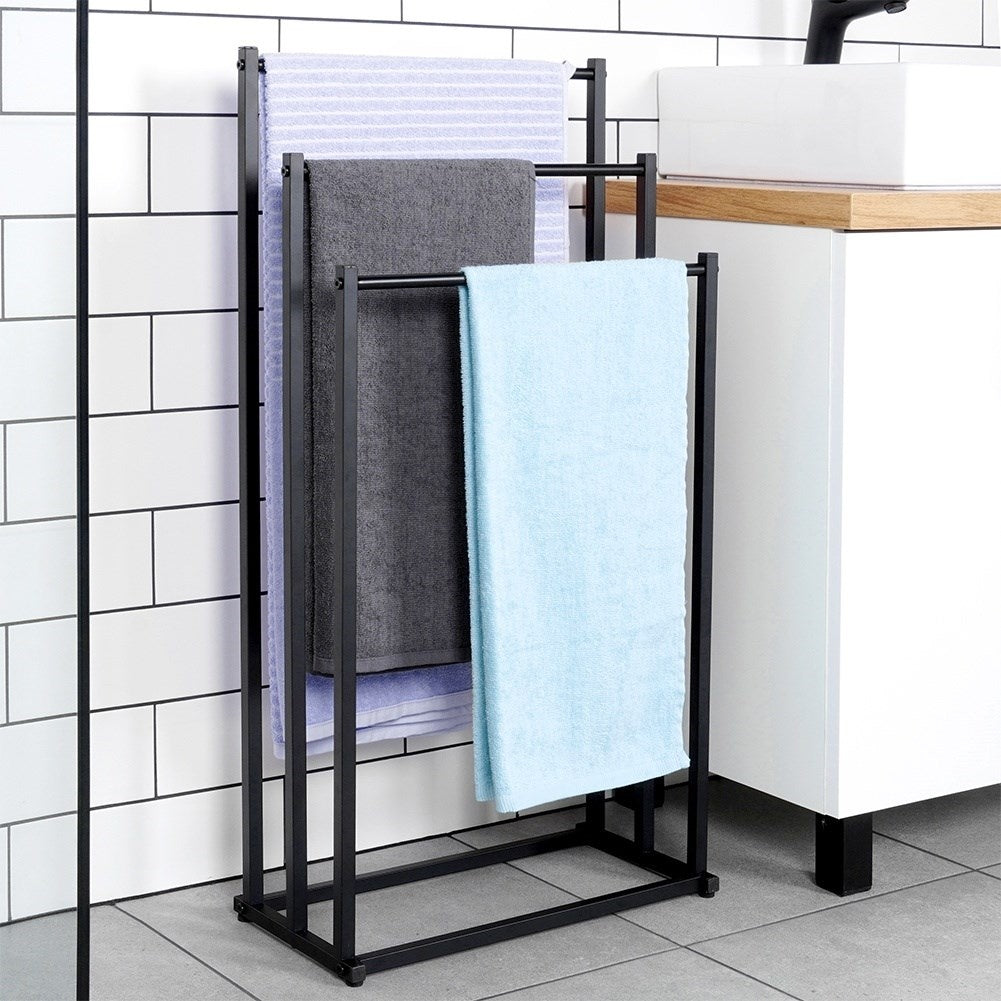 Freestanding towel rail with 3 black metal bars