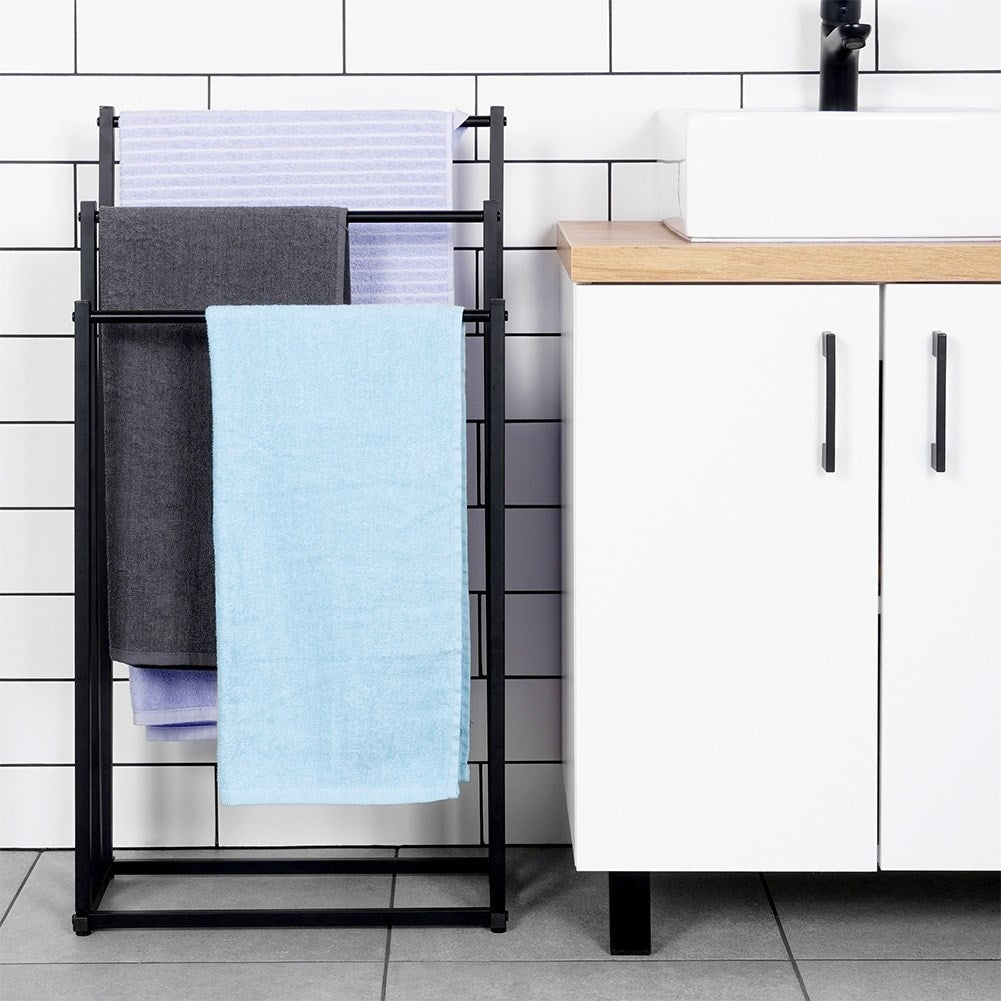 Freestanding towel rail with 3 black metal bars