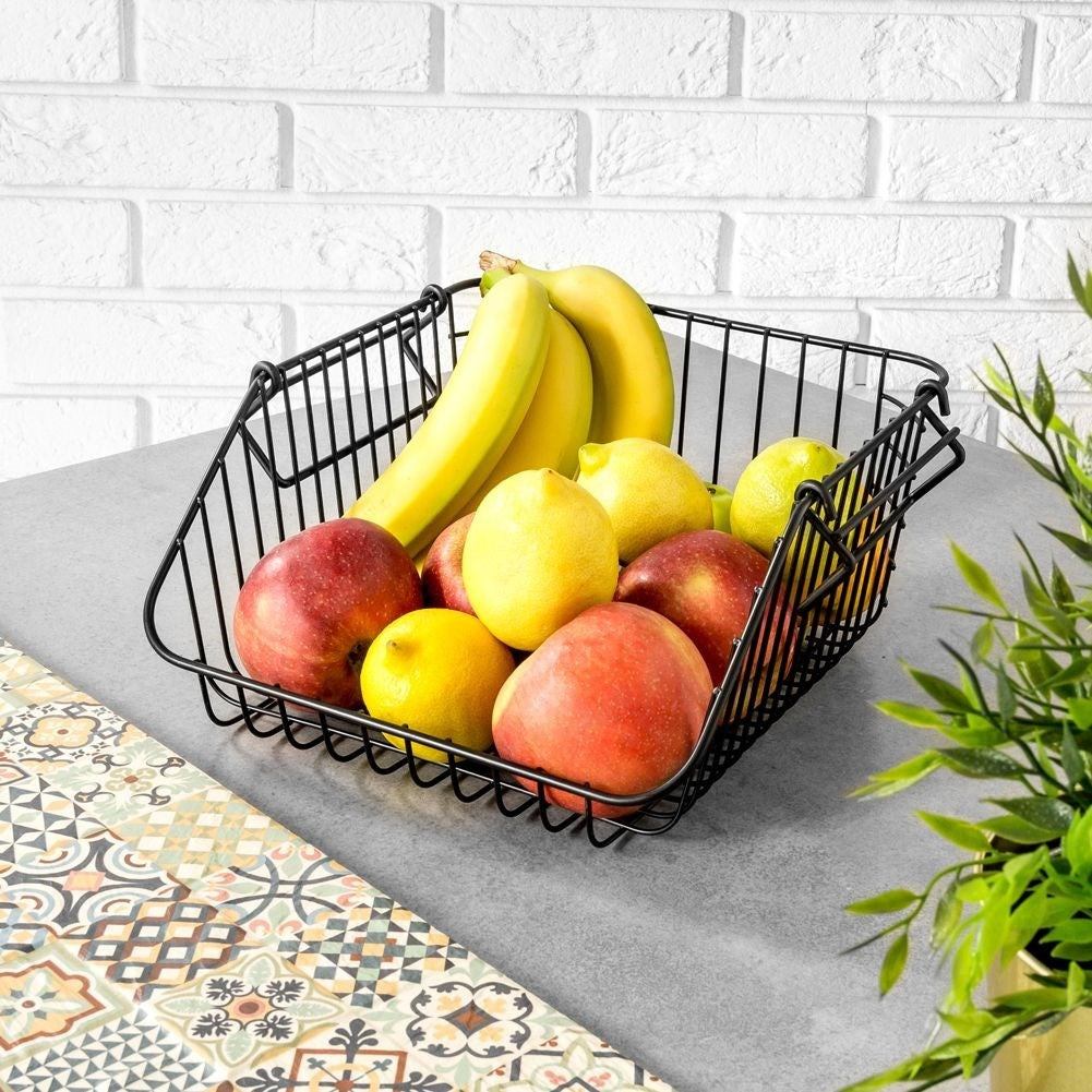 Fruit and vegetable basket in stackable black metal