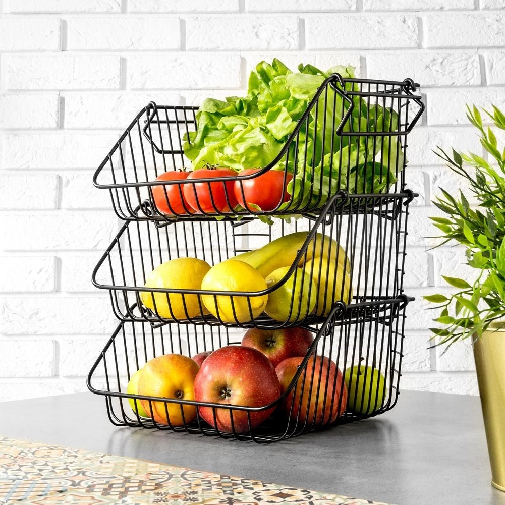 Fruit and vegetable basket in stackable black metal