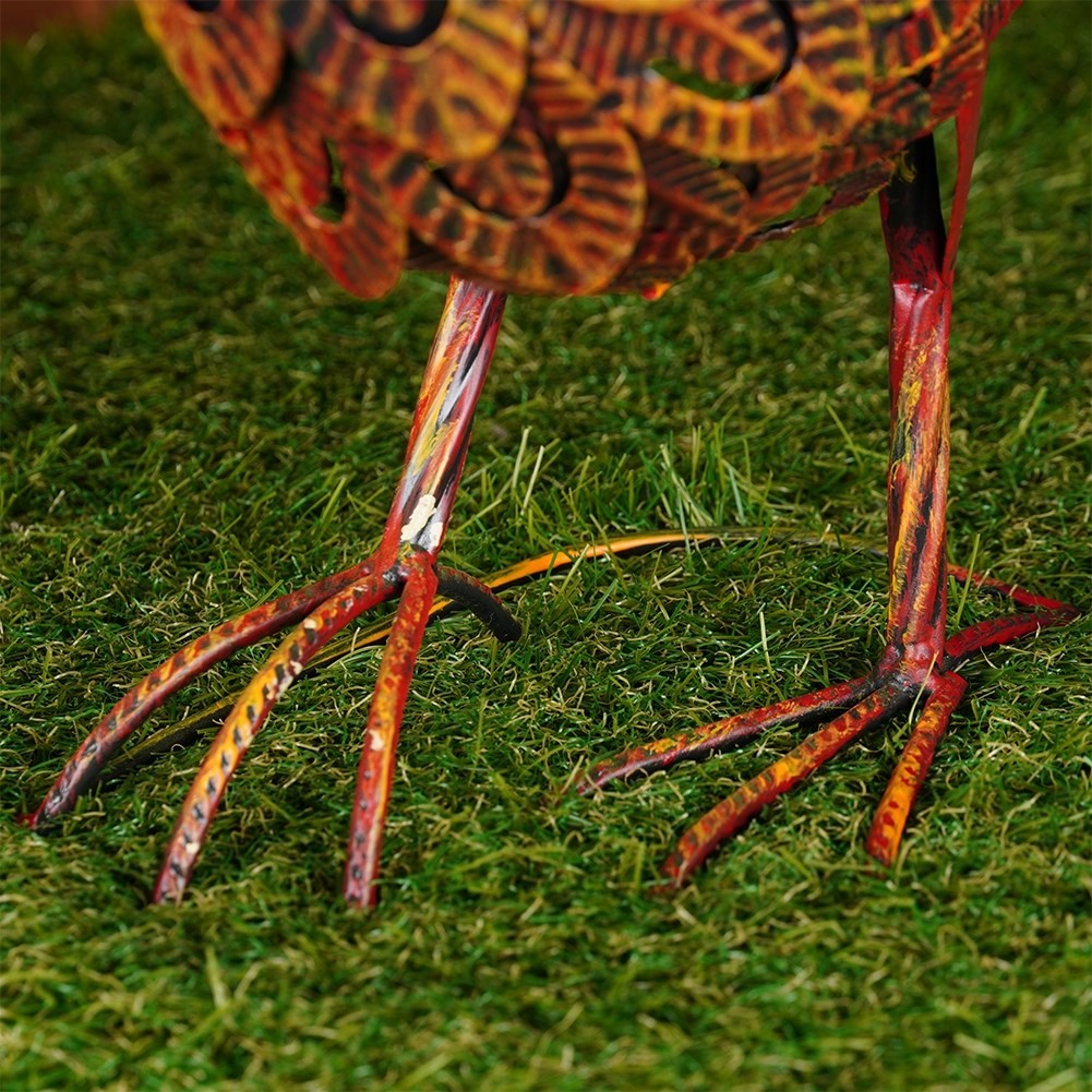 Garden figure pheasant in metal with vibrant colors