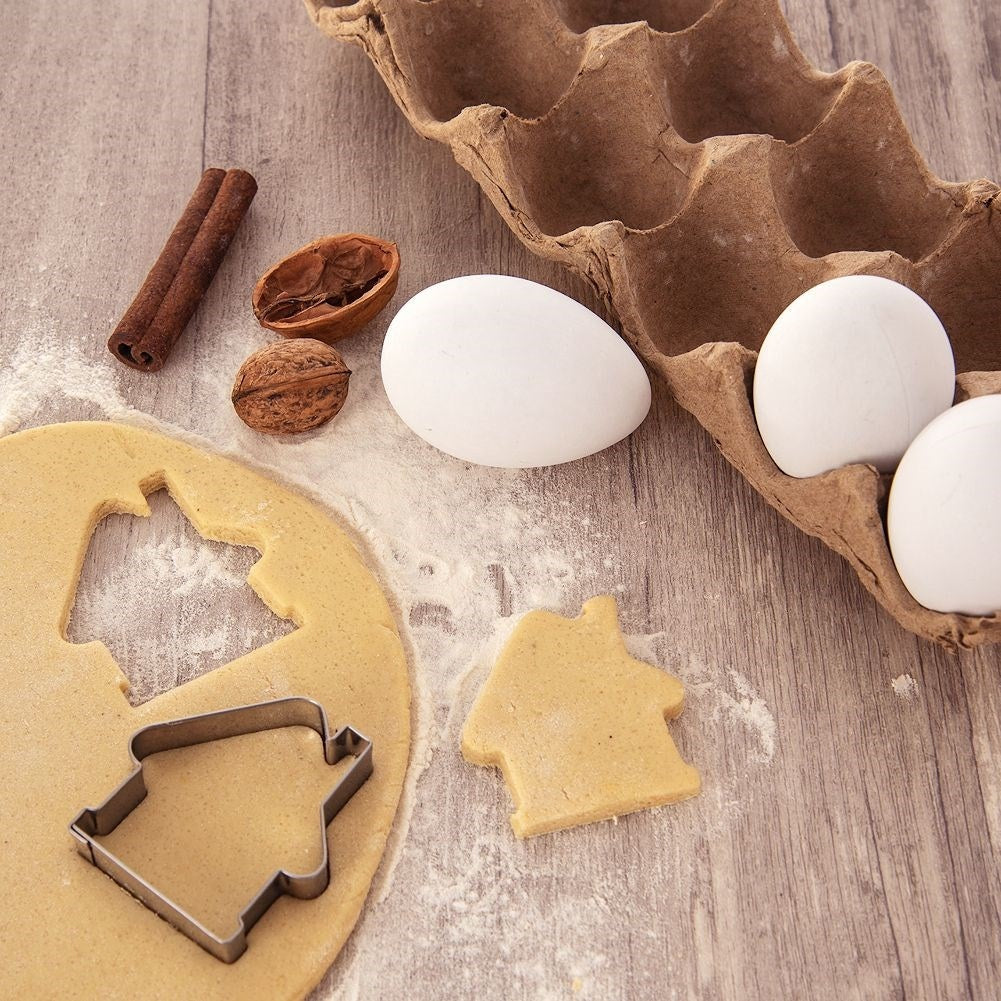 Gingerbread house form in durable stainless steel