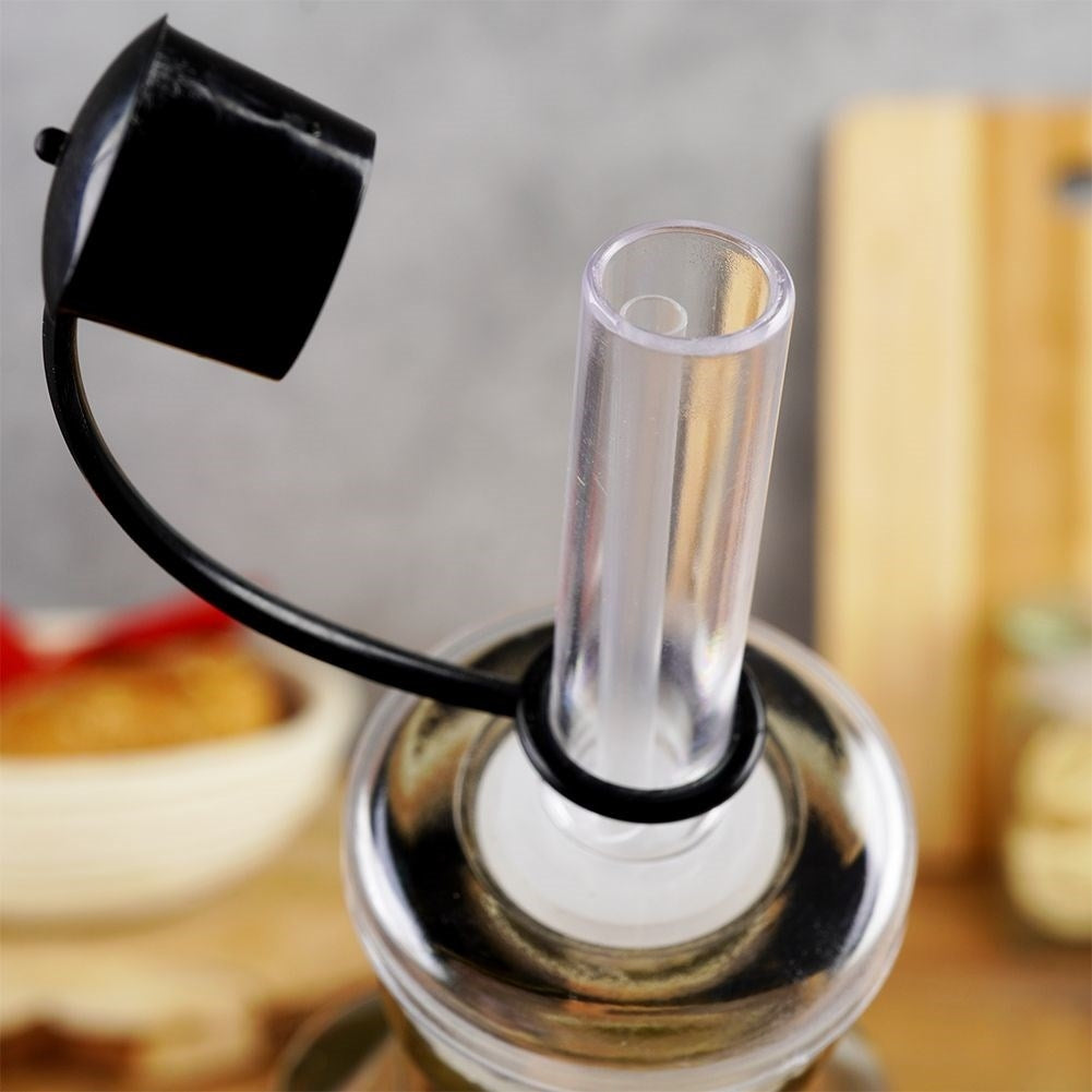 Glass bottle 500 ml with resealable dosage for olive oil