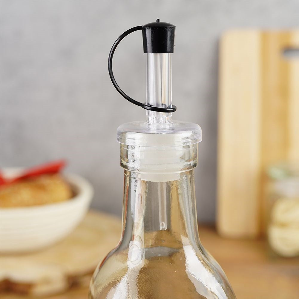 Glass bottle 500 ml with resealable dosage for olive oil