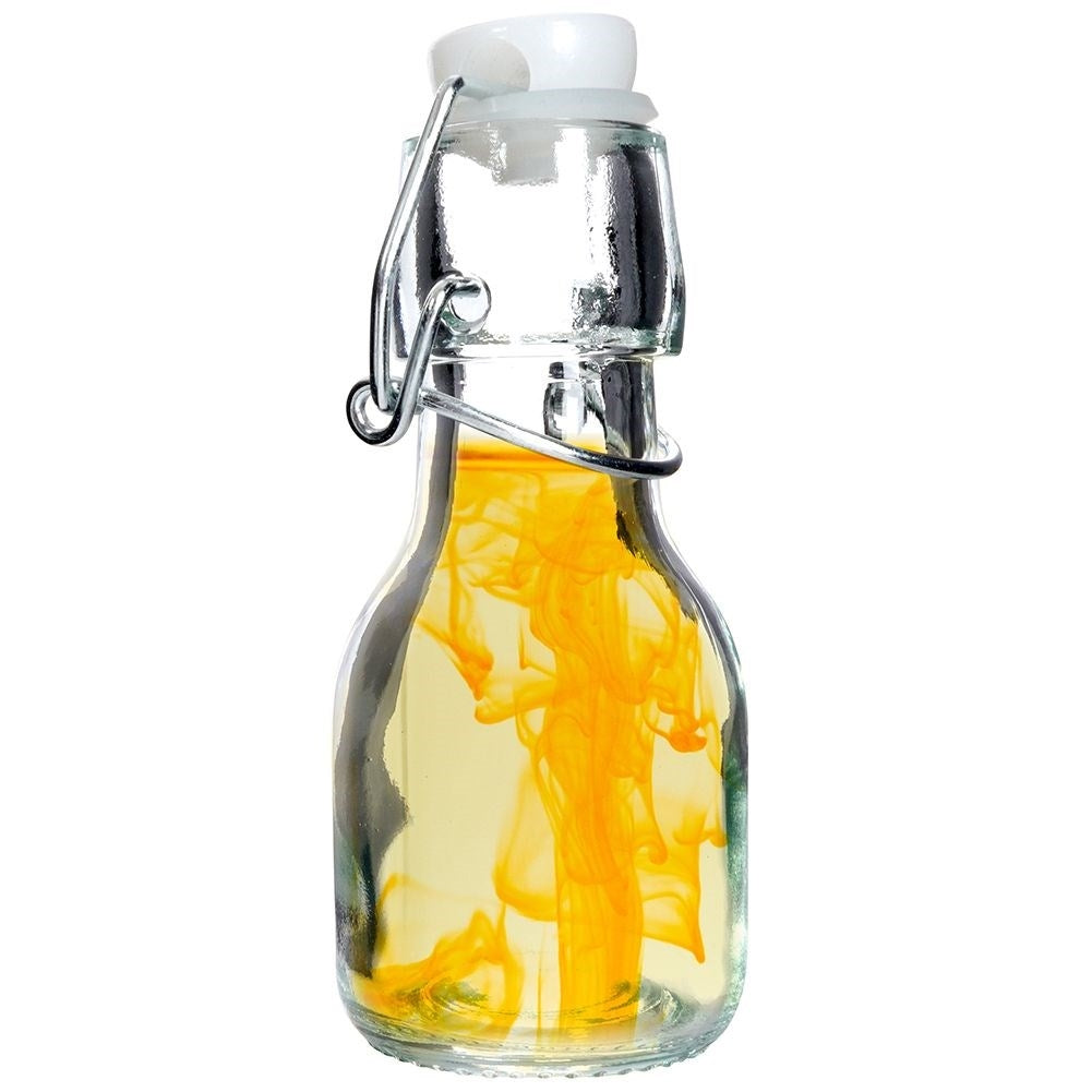 Glass bottle for oil/vinegar with garlic, herbs & chilli