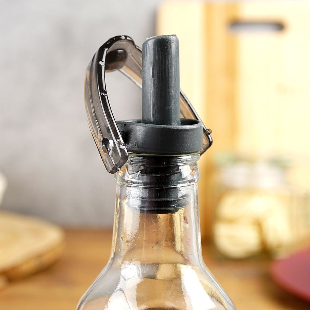 Glass bottle for oil/vinegar with pouring spout and cap