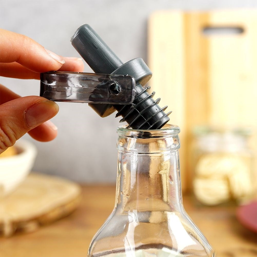 Glass bottle for oil/vinegar with pouring spout and cap