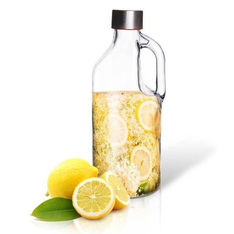 Glass bottle with metal cap and easy-to-pour handle