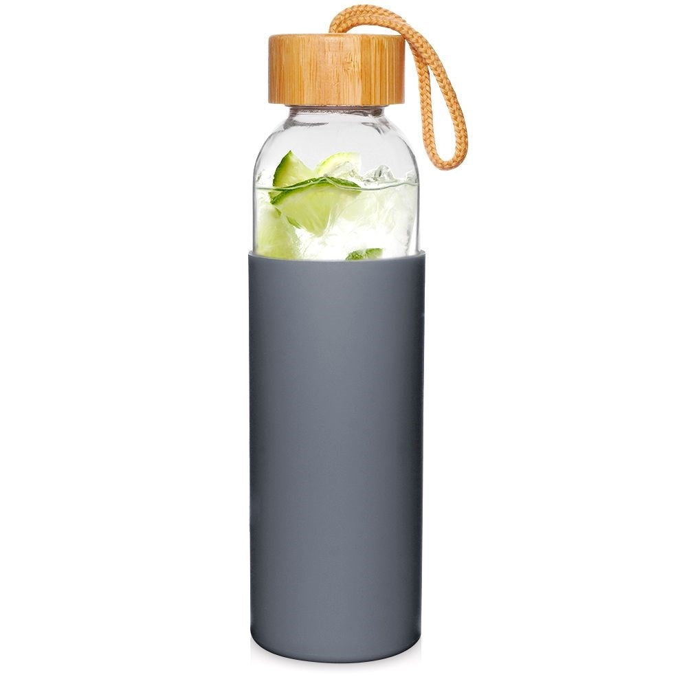 Glass bottle with silicone cover and wooden cork for drinks