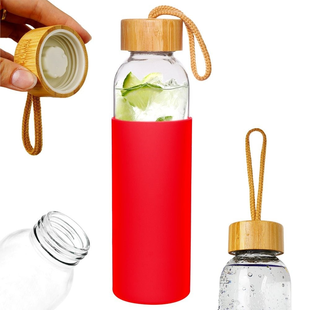 Glass bottle with silicone cover and wooden cork for drinks