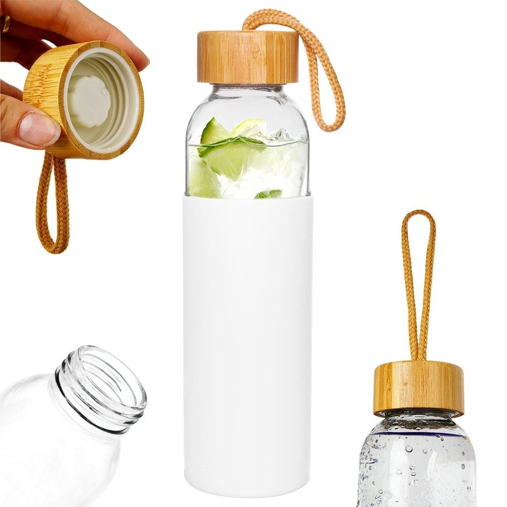 Glass bottle with silicone protection and wooden lid for drinks