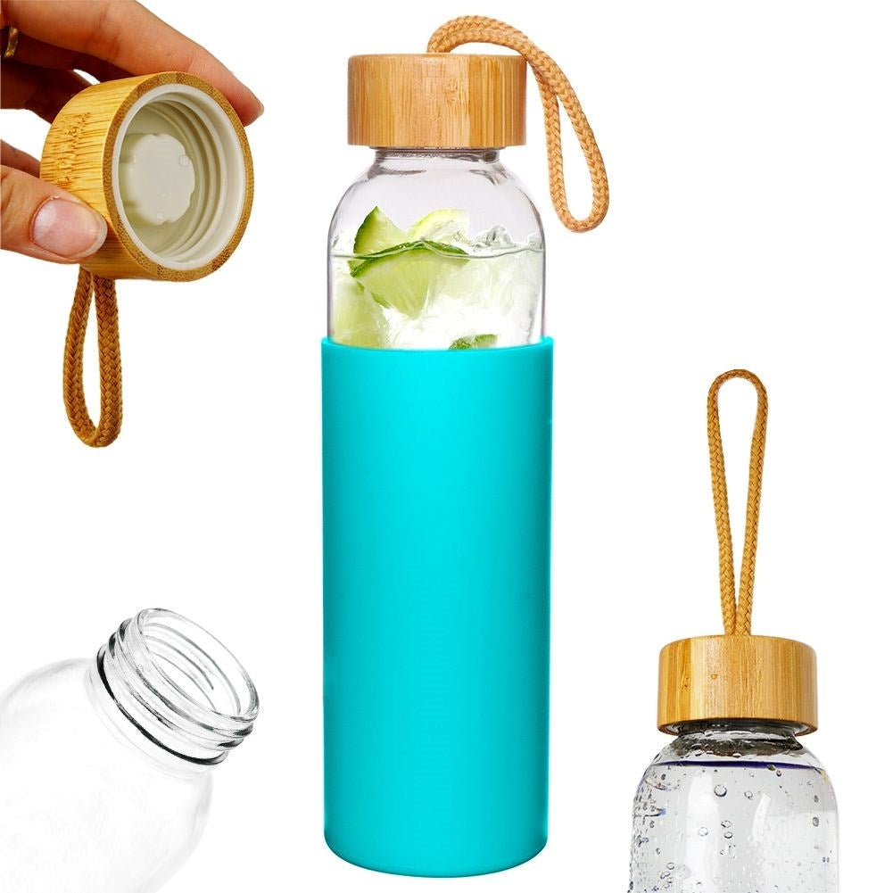 Glass bottle with silicone protection and wooden lid for drinks