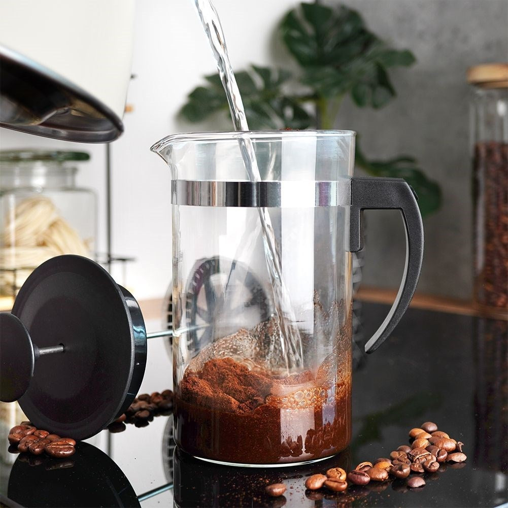Glass brewer with plunger for coffee, tea and milk frothing.