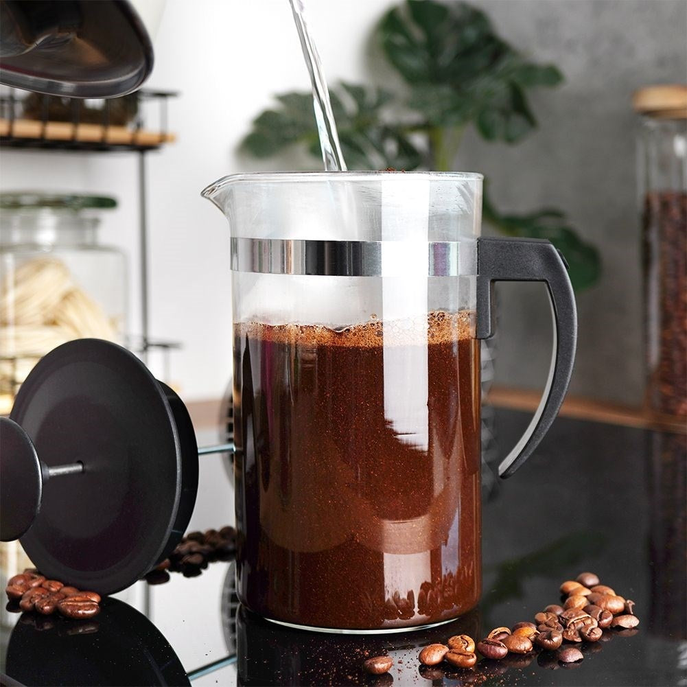 Glass brewer with plunger for coffee, tea and milk frothing.