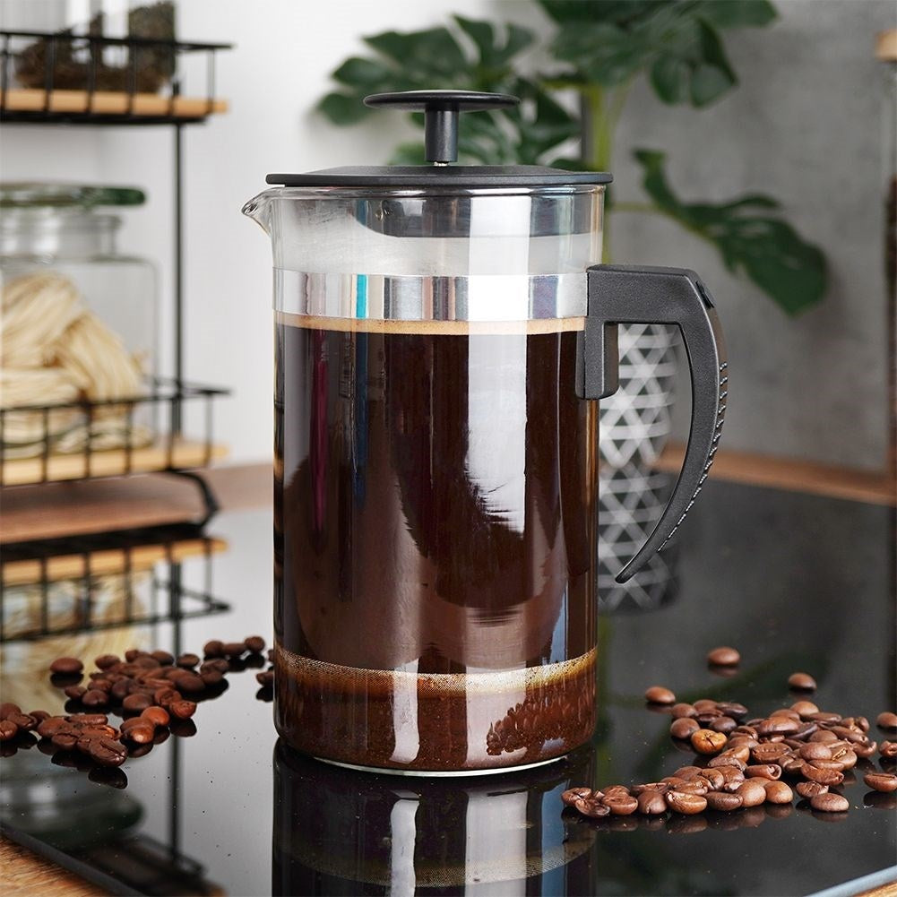 Glass brewer with plunger for coffee, tea and milk frothing.