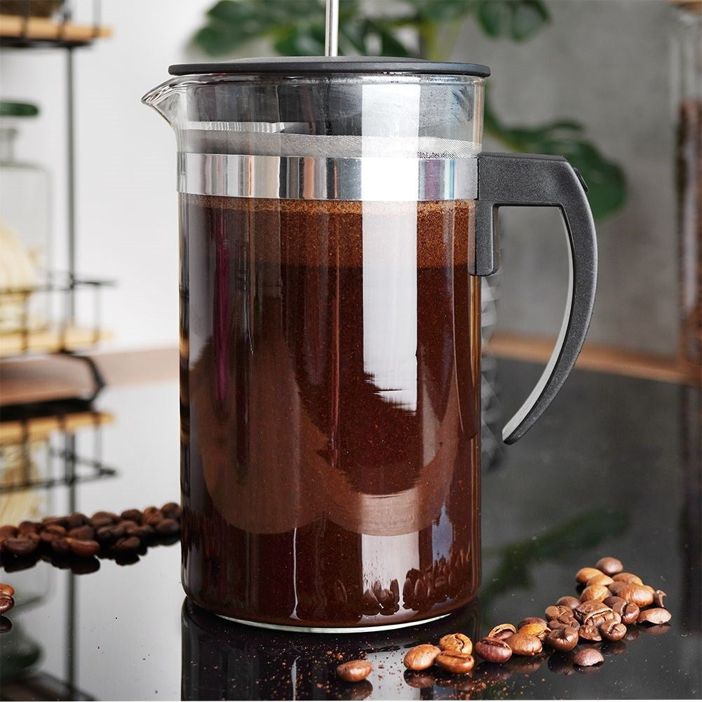 Glass brewer with plunger for coffee, tea and milk frothing.
